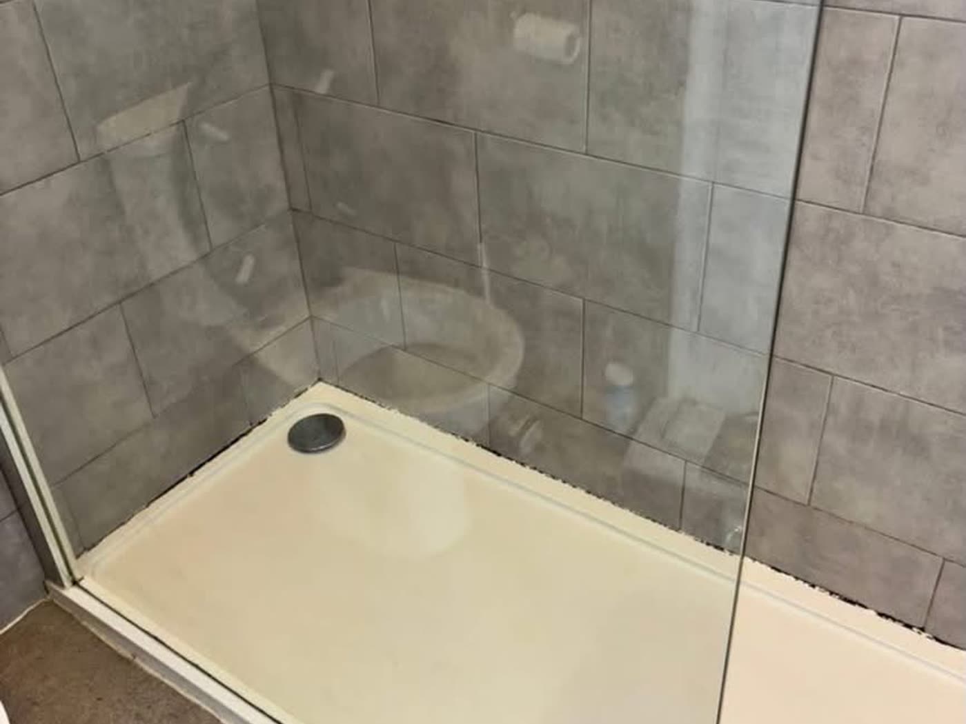 Shower tray cleaned